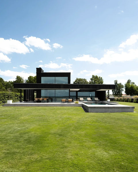 Villa K: A House Drawn Toward the Water