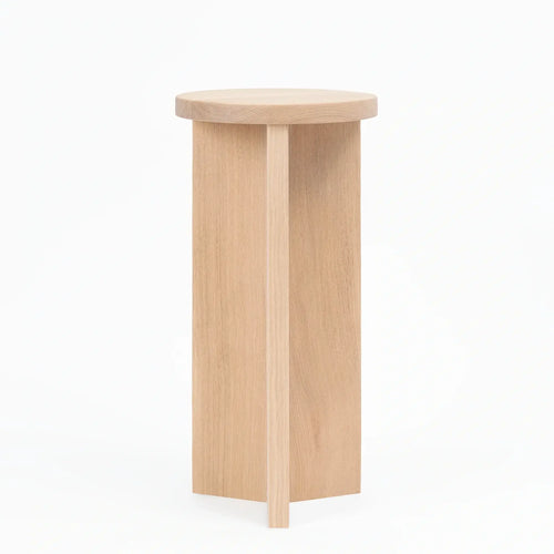 Pedestal Affe made of solid oak wood showcasing minimalistic design, perfect for any space.