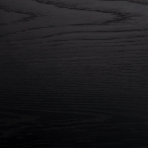 Black wood sample showcasing grain and finish, perfect for evaluating quality and selection at home.