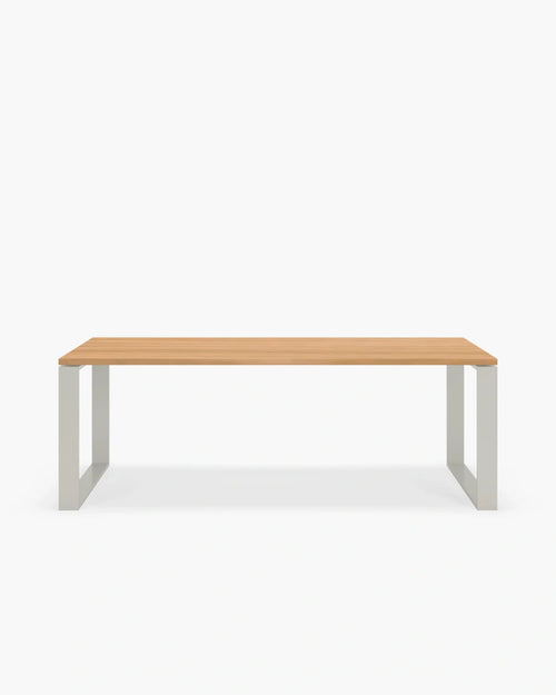 Diana dining table featuring a sleek beige frame and wooden top, perfect for modern dining spaces.