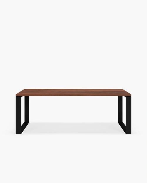 Diana dining table in black and dark oak, featuring a minimalist design and dramatic tones for a striking centerpiece.