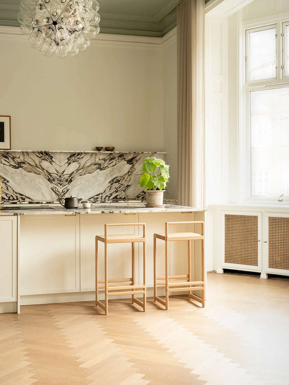 Ebba bar stools in solid oak in a Scandinavian kitchen in Indre By, Copenhagen