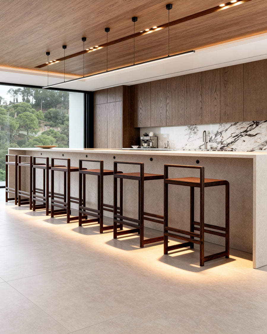 This image shows 10 Ebba barstools from by Crea in dark stained oak in a Dark oak minimalistic kitchen with contemporary light stone marble top.