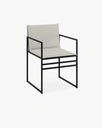 Elsy outdoor chair featuring Scandinavian design, modern structure, and neutral fabric, perfect for garden spaces.