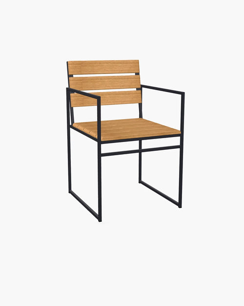 Elsy Wood Chair from by Crea featuring oak wood slats, slim black frame, and minimalist armrests, perfect for Scandinavian dining or stylish patio seating.