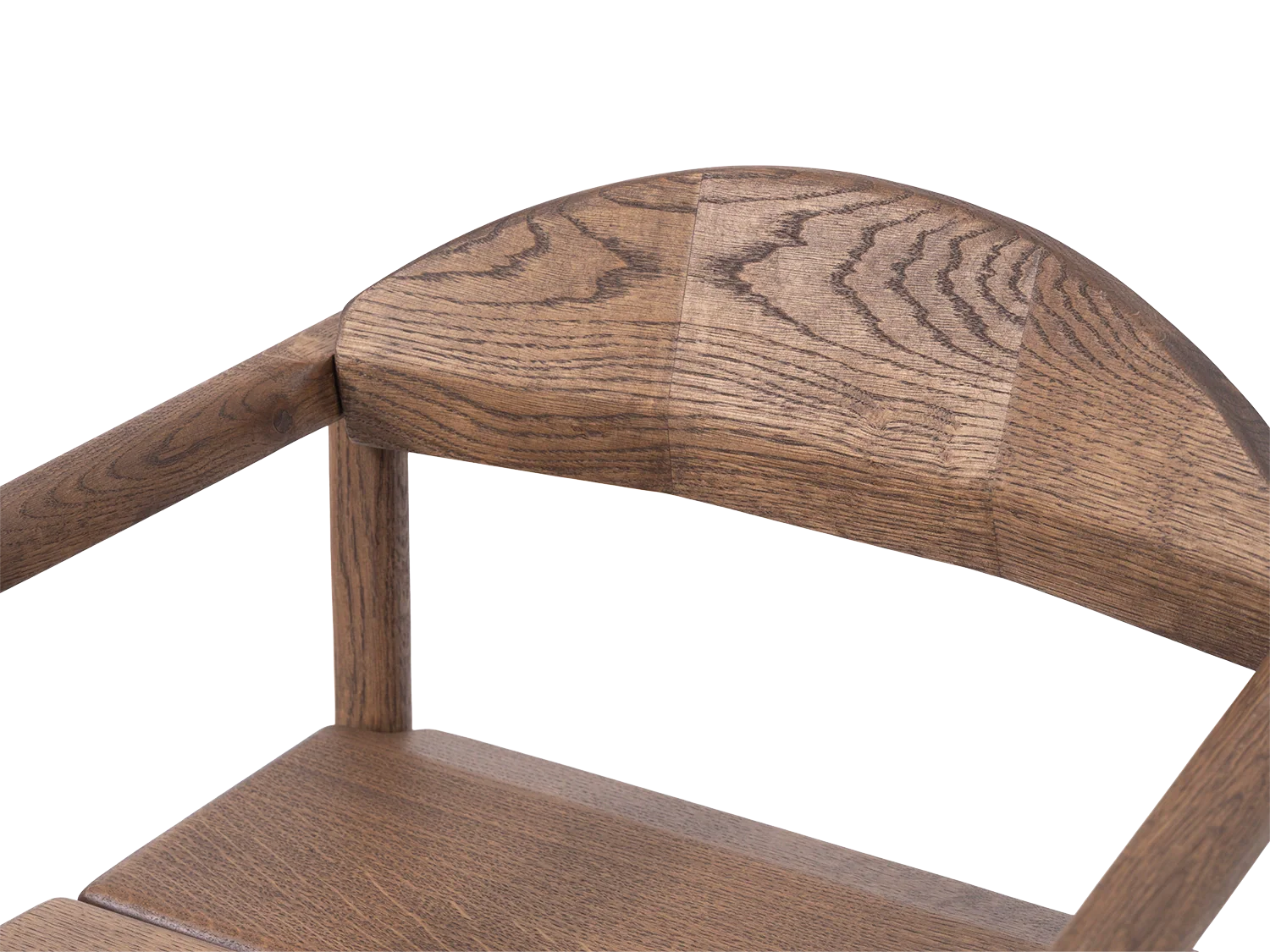 Close-up of Erik Dining Chair backrest in solid dark oak, highlighting the curved woodwork and fine grain detail | by Crea.