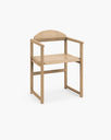 Erik dining chair in solid wood, featuring a timeless Scandinavian design with curved arms for comfort.