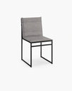 Isa outdoor chair in black frame with grey fabric seat, showcasing minimalist Scandinavian design for timeless outdoor beauty.