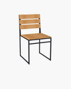 Isa Wood Chair from by Crea with clean Scandinavian lines, oak wood slats, and a matte black frame, ideal for modern dining spaces or outdoor patios.