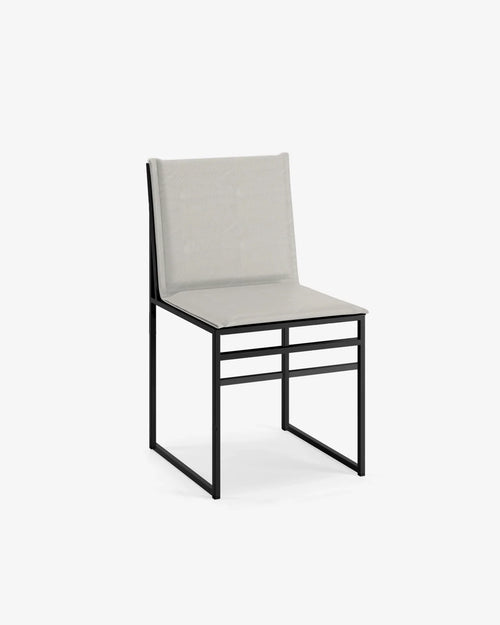 Isa outdoor chair in gray fabric with a black metal frame, perfect for patios and gardens.