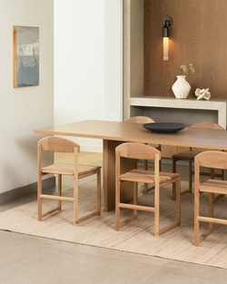 Karin dining chairs in solid oak by Crea, styled with the Ann oak dining table in a high-end architectural home interior.