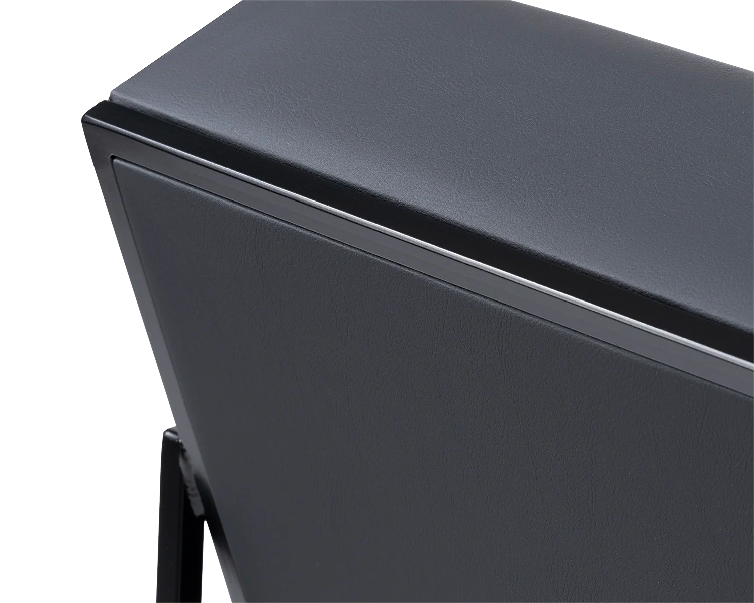 Kent Steel Armchair backrest detail showcasing matte black frame and black vegan leather upholstery with clean Scandinavian lines | by Crea.