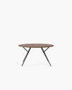 Luna dining table in black and dark oak, showcasing a sleek and modern round design ideal for elegant dining.