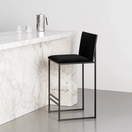 Philip bar stool in black frame with black velvet seat, ideal for modern interiors and comfort.