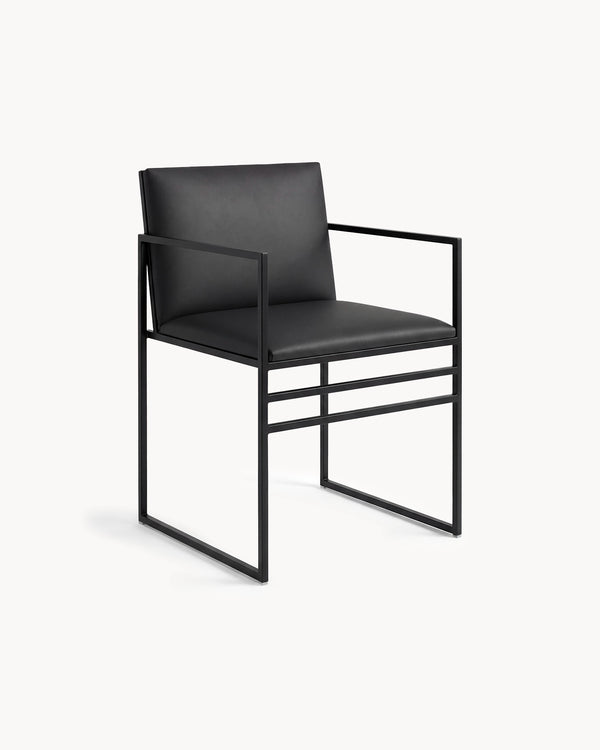 Dining Chair Sella by Crea with black frame and jade black leather seat, ideal for dining tables in residential interiors.