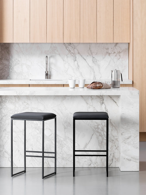 Bar Stool Svea – Black – Jade Black Leather in a modern kitchen setting.