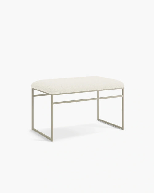 Wilma bench with a soft taupe frame and cushioned seat, showcasing Scandinavian design for a stylish interior.