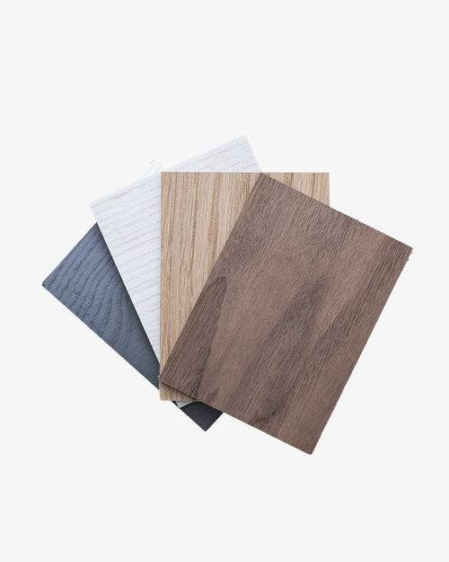Wood samples showcasing various finishes, including gray, white, light wood, and dark wood for quality selection.