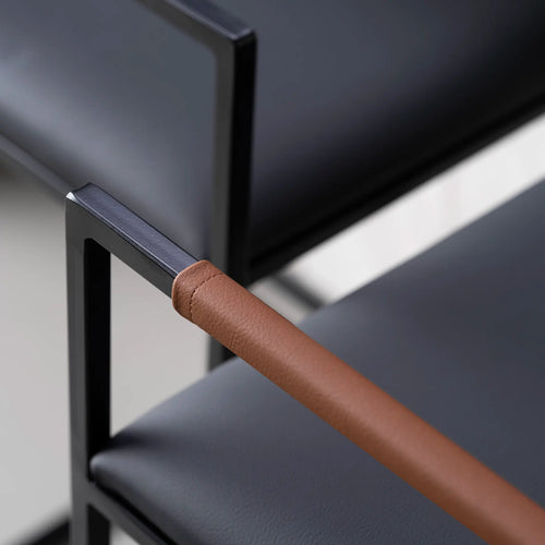 Arm and Backrest in Chocolate vegan leather, fitted to a black steel by Crea chair