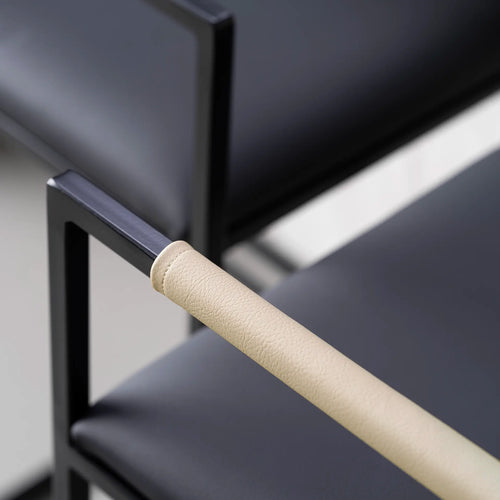 Arm and Backrest in Sand vegan leather, fitted to a black steel by Crea chair