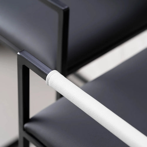 Arm and Backrest in White vegan leather, fitted to a black steel by Crea chair