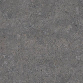 Close-up of Dekton Grafite sintered stone, a dark graphite grey surface with fine speckling