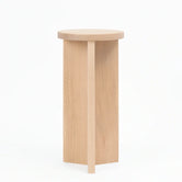 Pedestal Affe made of solid oak wood showcasing minimalistic design, perfect for any space.