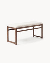 Oak Bench Alva with dark oak frame and ivory bouclé cushion, perfect for dining interiors and hallways.
