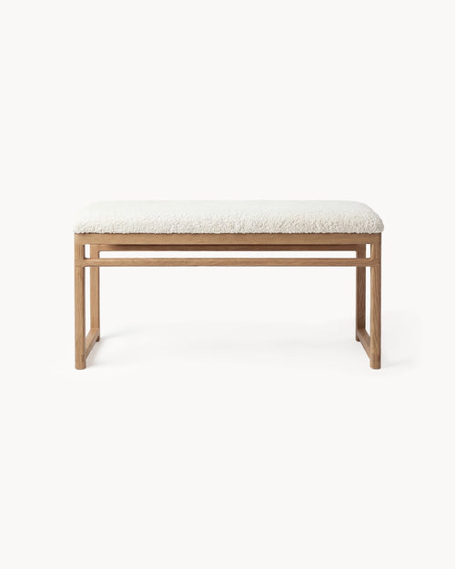 Oak Bench Alva - Natural oak frame with ivory bouclé cushion for comfort and style.