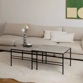 Coffee table Anton - Small set - Black frame - Grigio Dekton top in modern living room.