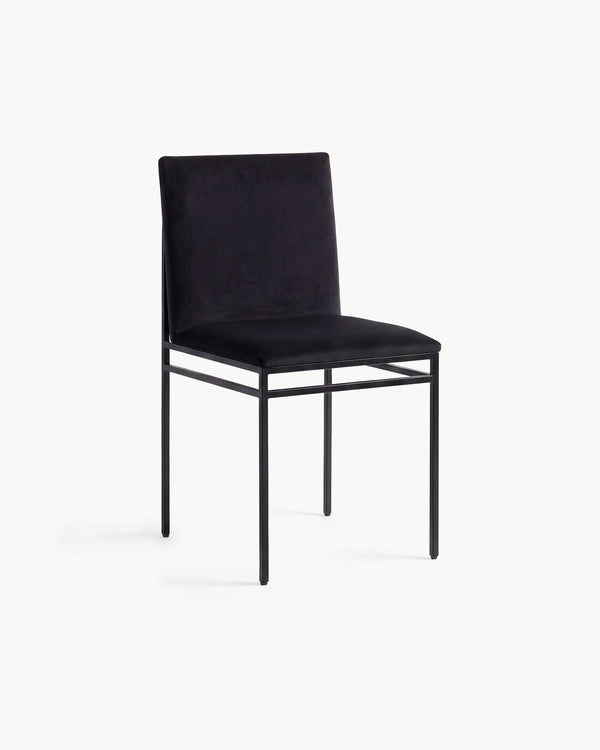 Dining Chair Bella by Crea in jade black velvet on a black powder-coated steel frame, three-quarter view