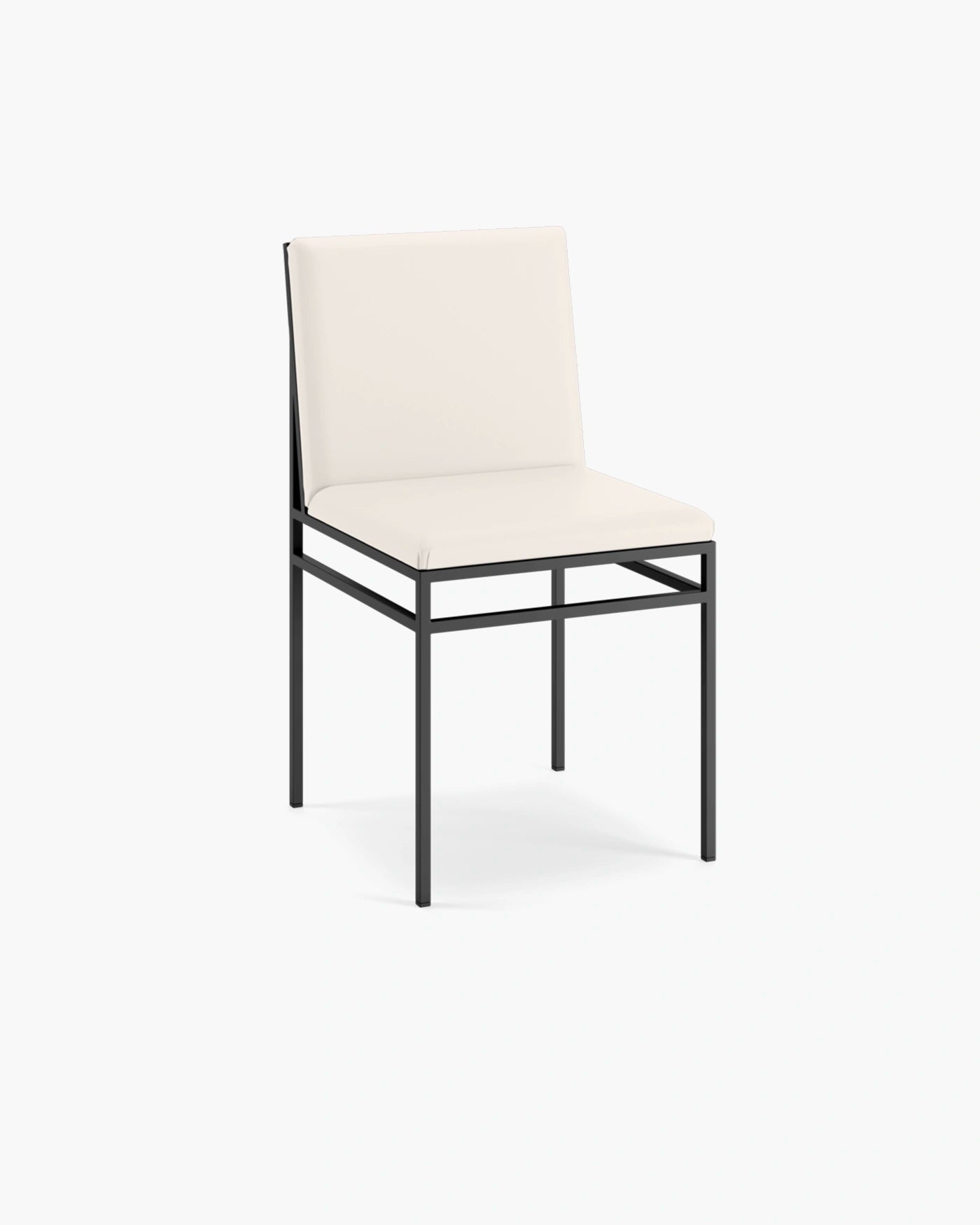 Bella dining chair in sand leather with black frame, showcasing modern elegance and sophistication.