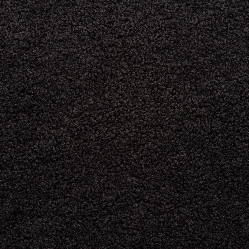Close-up of the black bouclé upholstery used on the Anton bench