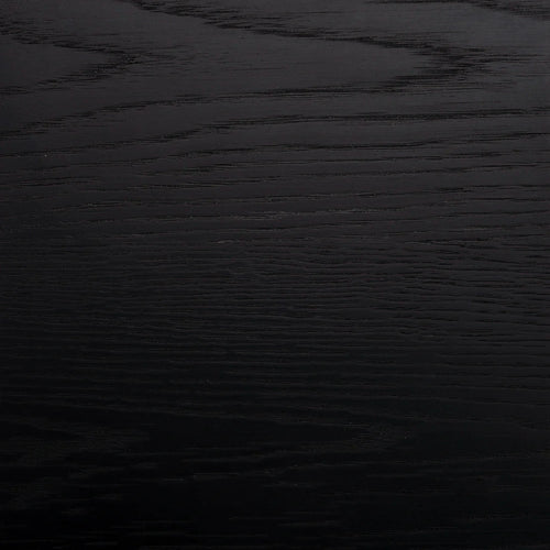 Black wood sample showcasing grain and finish, perfect for evaluating quality and selection at home.