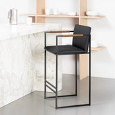 Bar Stool Bruno – Black – Jade Black Leather, modern bar stool design with sleek lines and elegant materials.