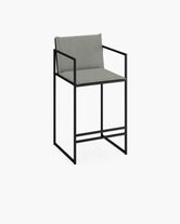Bar Stool Bruno Outdoor in black with a gray cushion for comfort and style in outdoor spaces.