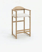 Oak Bar Stool Carl in oak with ivory bouclé seat, showcasing minimalist design and warm wood texture.