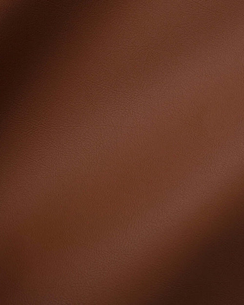 Close-up of Chocolate vegan leather, showing its fine grain