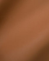 Close-up of Coffee Bean vegan leather, showing its fine grain