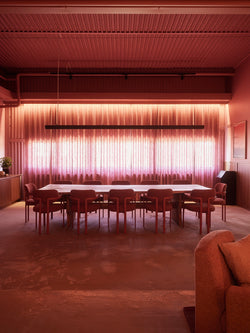 conference room chairs around a long table at Norrbottens Destilleri.