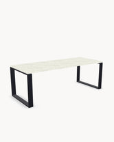 Outdoor dining table Diana, Design Your Own, shown with a black frame and Sabbia Dekton top.