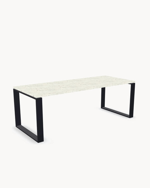 Outdoor dining table Diana, Design Your Own, shown with a black frame and Sabbia Dekton top.