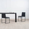Diana dining table in black with black oak, accompanied by sleek black chairs—ideal for modern dining spaces.