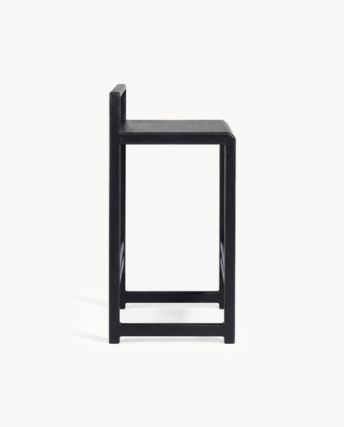 Oak Bar Stool Ebba in black oak frame, side view showcasing solid wood construction and integrated backrest.
