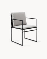 Outdoor chair Elsy in black frame with marble acrylic cushion, perfect for contemporary outdoor settings.