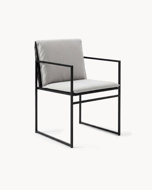 Outdoor chair Elsy in black frame with marble acrylic cushion, perfect for contemporary outdoor settings.