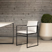Elsy outdoor chair in black frame with marble acrylic, enhancing contemporary outdoor spaces with sleek design.