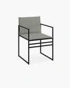 Elsy outdoor chair in sleek black with fossil acrylic, ideal for modern outdoor spaces.