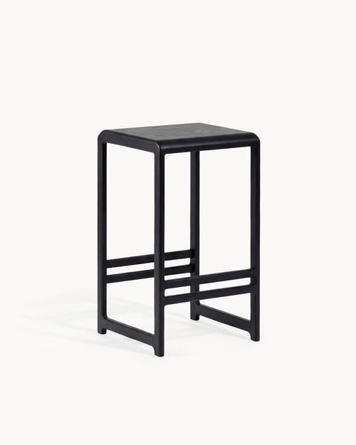 Oak Bar Stool Eva in Black Oak with wooden seat, ideal for kitchen islands and counter tops.