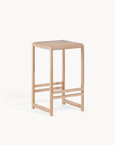 Oak Bar Stool Eva with a natural oak finish and minimalist design, perfect for dining and bar spaces.